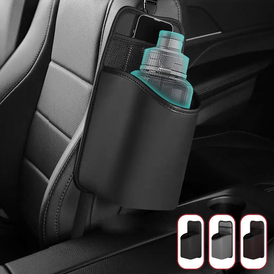 A close-up of a PU leather car seat side organizer being blotted with a clean microfiber cloth
